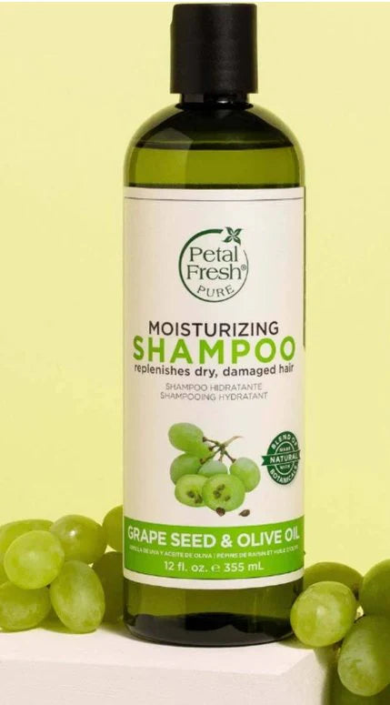 Bottle of Petal Fresh Moisturizing Shampoo with grape seed and olive oil on a white background